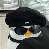 Qu