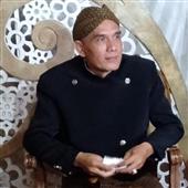 NĂ