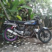 Cu